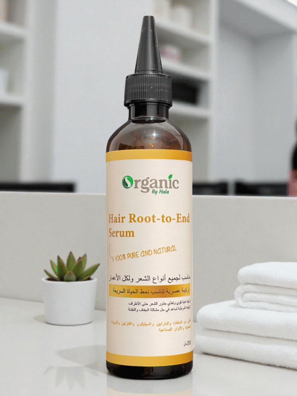 "Organic by Hala Root to End Hair & Scalp Serum bottle for balanced scalp and smooth ends – hydration treatment."