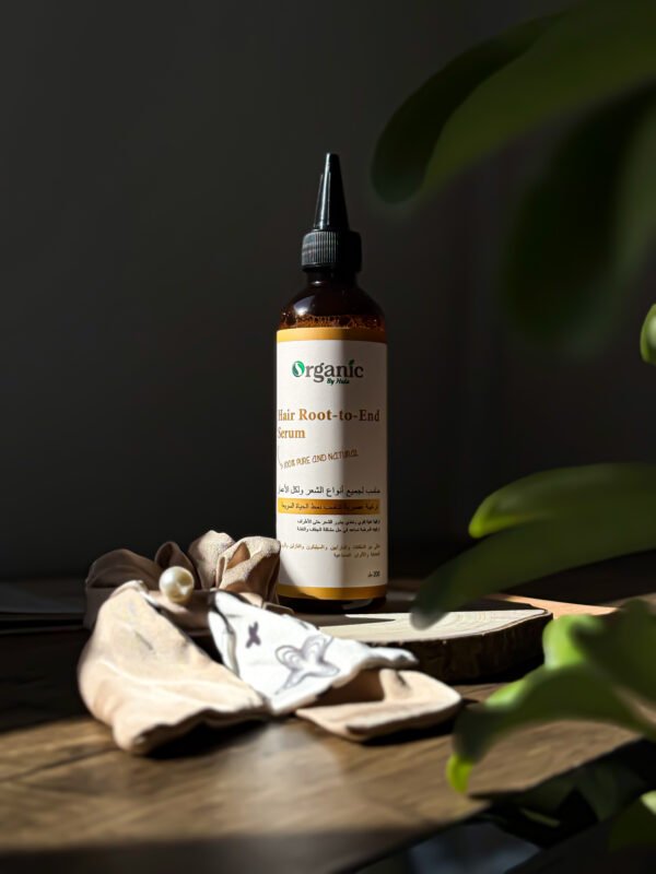 Organic by Hala Root to End Hair & Scalp Serum bottle for balanced scalp and smooth ends – hydration treatment.